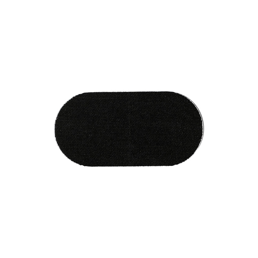 Black oval-shaped object on a white background.